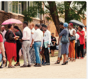 People standing on qeue